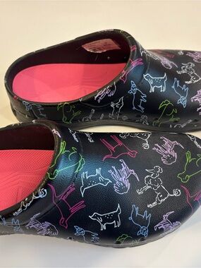 Dansko Black Slip-On Clogs with Neon Dog Print and Pink Insole